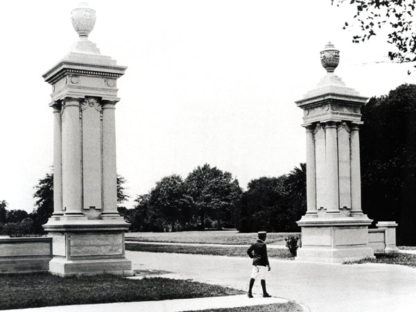 historic entrance columns at Audubon Park in New Orleans with classical architecture and landscaped grounds in early 20th century
