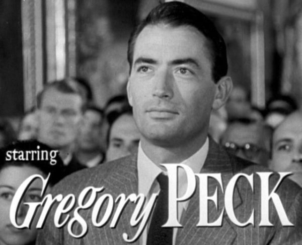 Gregory Peck signs autographs at an American Cancer Society event in New Orleans on April 5, 1966.