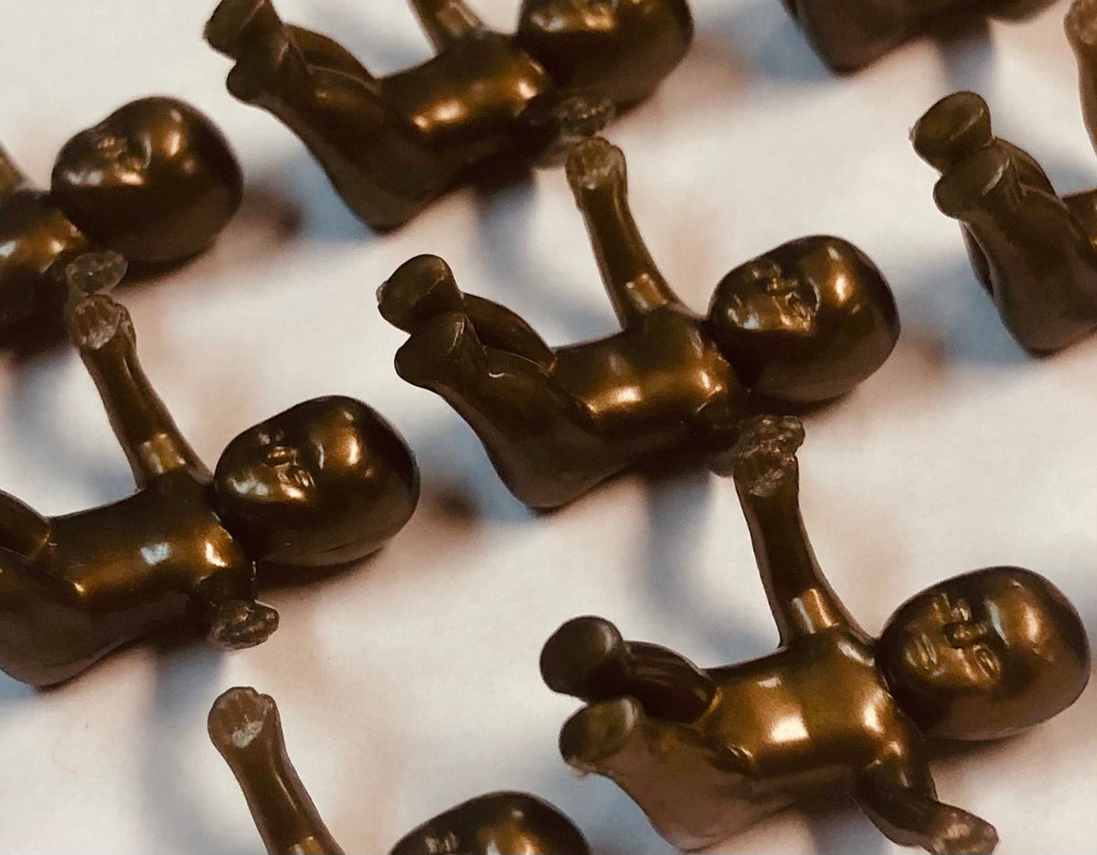 Gambino's king cake babies, the ten-count pack the bakery sells for Carnival parties.