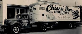 Vintage delivery truck from Chisesi Bros Poultry in New Orleans highlighting historic ham and meat distribution tradition.
