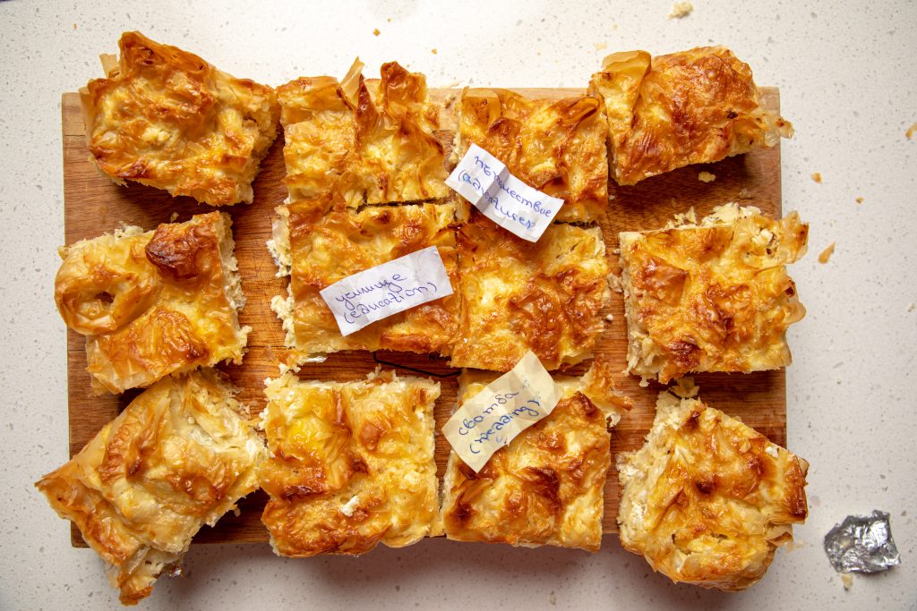 The banitsa from Bulgaria is also eaten during the Christmas season. Like many other versions of king cake, something is hidden inside for a lucky partygoer to find. Bulgarians hide a series of fortunes inside the banitsa, as well as a dogwood branch which symbolizes health and longevity.