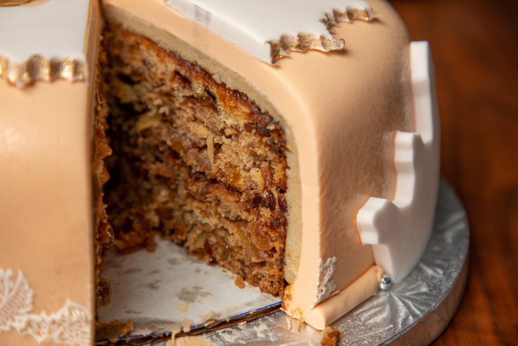England's Twelfth Night Cake has a bean hidden inside. Whoever finds the bean is crowned queen or king of the party. The Twelfth Night Cake is a form of fruit cake covered in a thick, royal icing.
