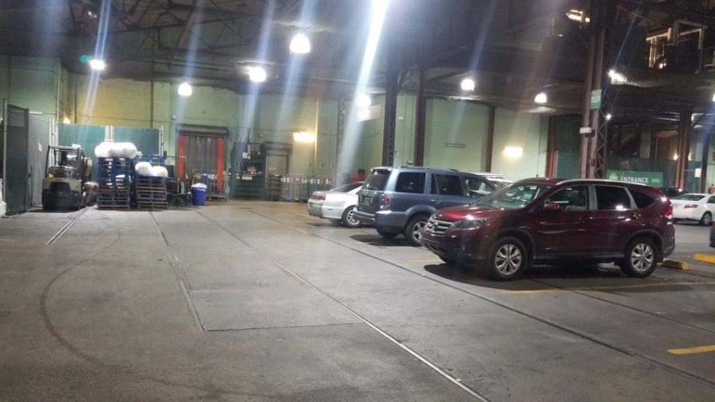 Inside the Whole Foods parking garage. The property was the Arabella Station streetcar barn, built no later than 1882. In February 1948, when buses replaced streetcars on this Magazine Street route, the barn was converted to accommodate the new transit mode. It became a Whole Foods in 2002. You can still see evidence of rail use in the left half of this picture.