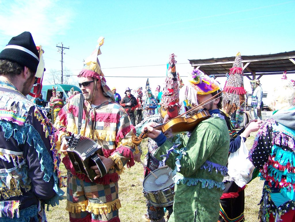 Wilson Savoy of the Pine Leaf Boys playing with other Cajun musicians at the 2010 Faquetaigue Courir de Mardi Gras in Savoy, Louisiana.