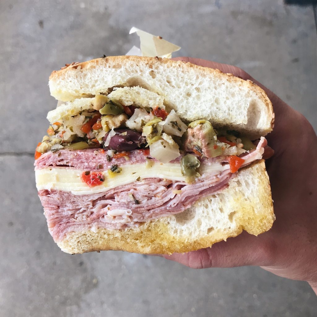 The muffuletta is one of the many lasting contributions of Sicilian immigrants to New Orleans.
