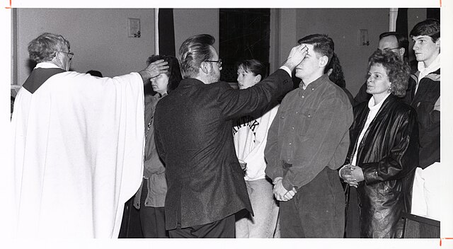 Ashes administered on Ash Wednesday on March 1, 1995.