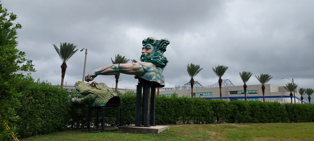 Neptune and the Alligator still point the way to Mardi Gras World.