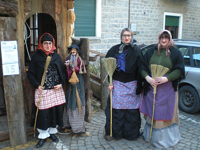 Three women dress up as Befana for their parade on Twelfth Night.  Parading has been common on Twelfth Night for centuries. That  tradition continues in modern day New Orleans. Photo by Eleonora Gianinetto on Creative Commons.