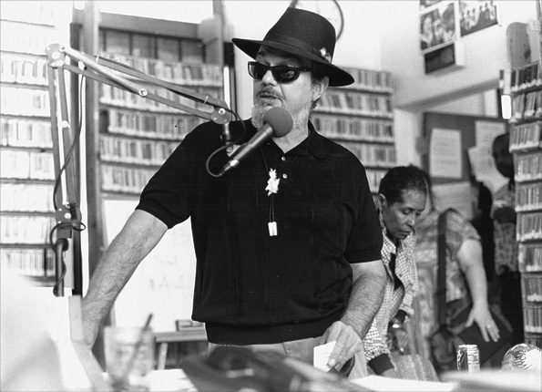 Photo Credit: WWOZ. Dr. John stops by the WWOZ building in Armstrong Park in 1993.